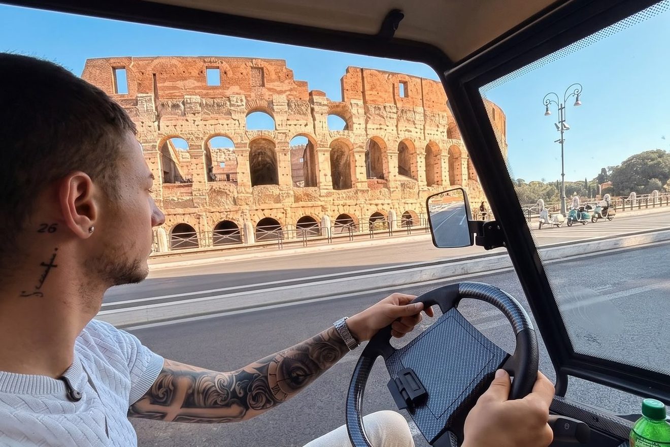 Driving past the Colosseum on a private golf cart tour of Rome