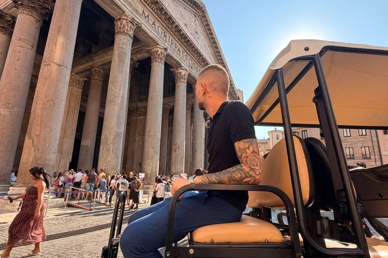 Golf cart stop at the Pantheon with the driver